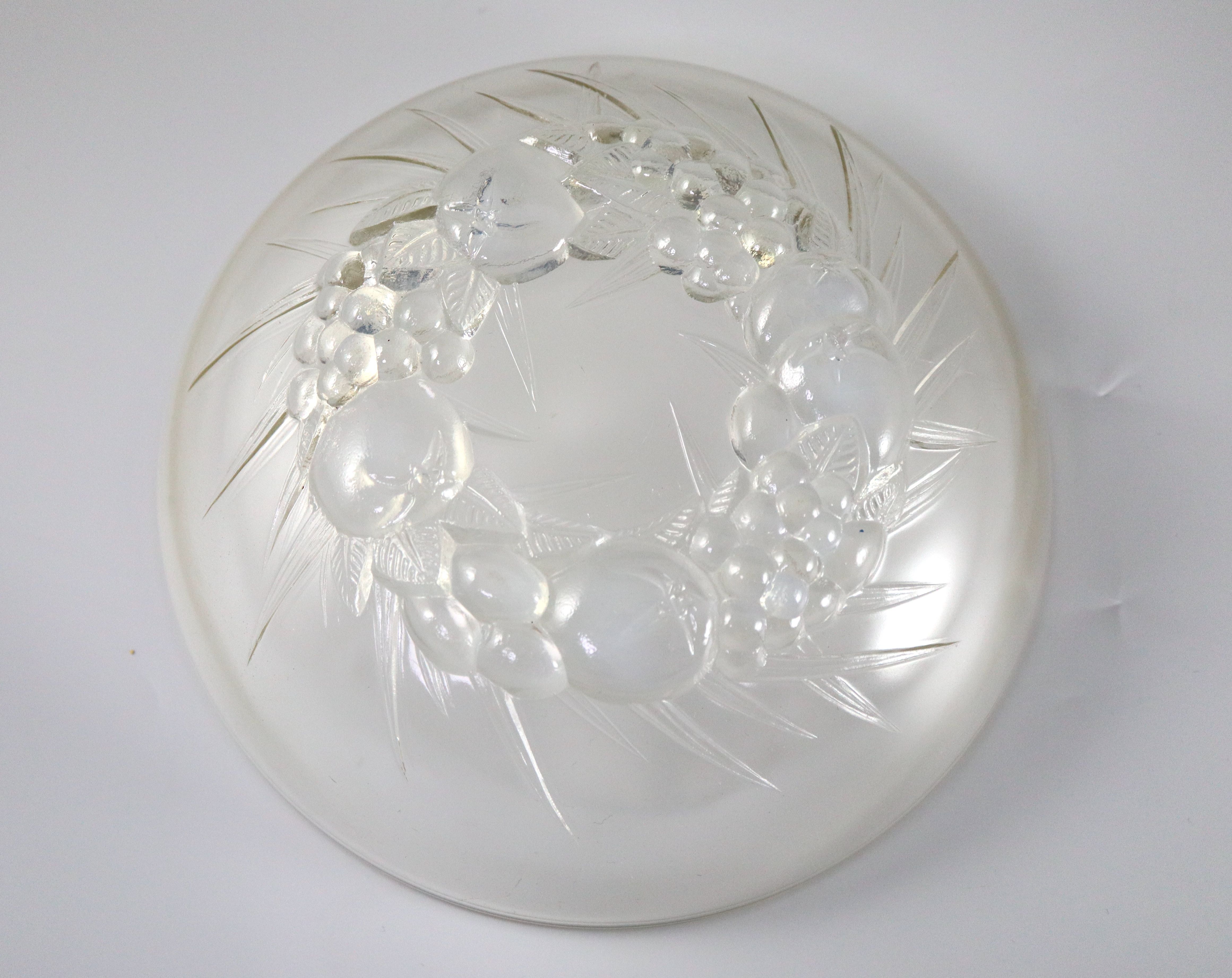 René Lalique. A pre-war amber tinted glass Mont-Dore pattern bowl, no.396, designed in 1928, 22cm diameter